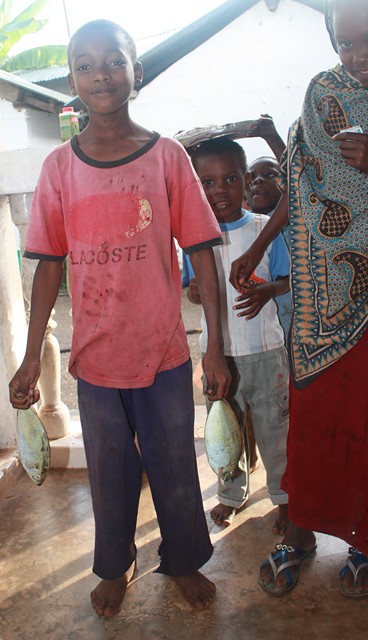 kids outside selling fish 019.jpgedit