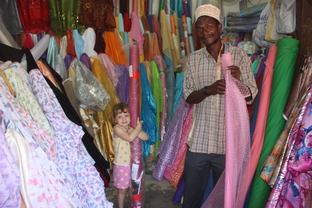 anni and Evy, anni buying fabric in mjini 006.jpgedit